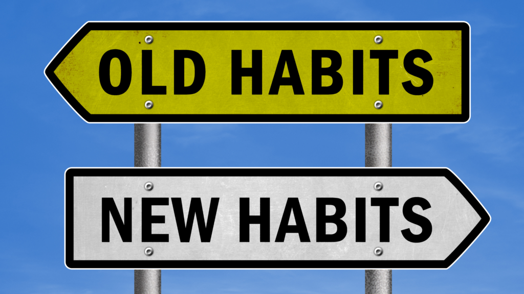Street Sign with Old Habits New Habits Written on Its First